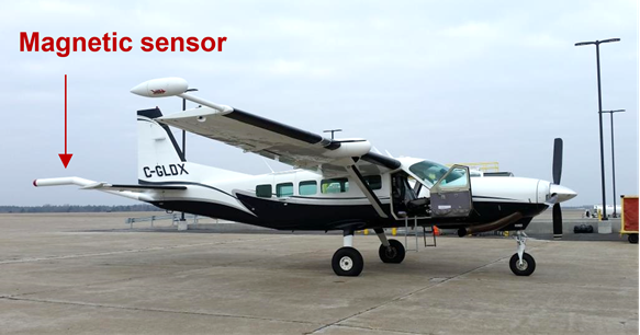Image shows a small aircraft at an airport with a stinger tail on it for the airborne geophysical data collection