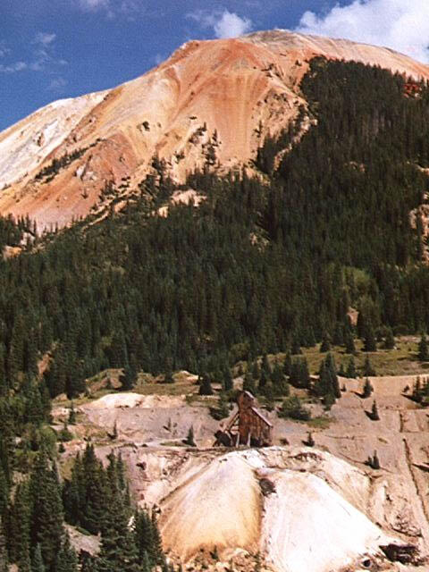 Mining and non-mining sources of metals and acid water near Silverton, Colorado. Image of eroding mountain and abandoned mine. Part of the Upper Animas River Study Area.
