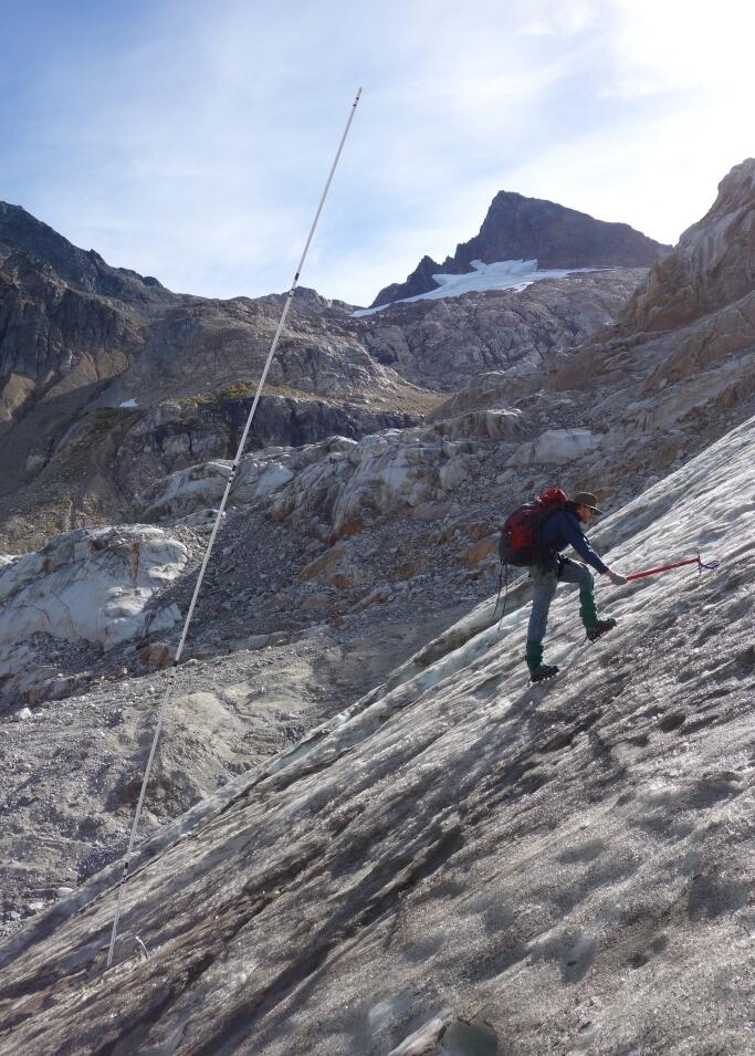 Scientist collecting samples on South Cascade Glacier, northwestern Washington State