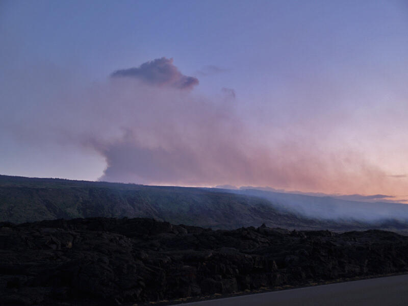 This is a photo of a plume of volcanic gas rising above Pu`u `O`o.