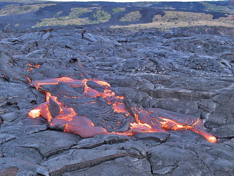 This is a photo of floating crust surrounded by oozing lava.