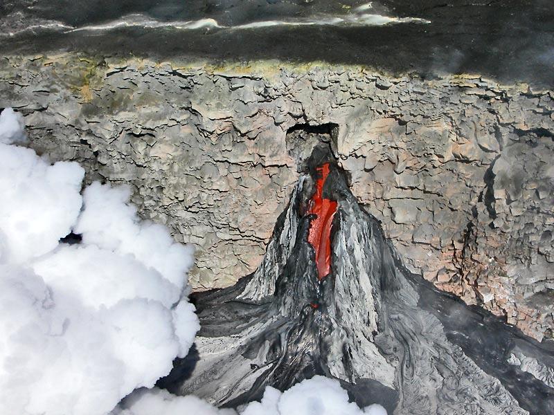 This is a photo of lava spilling from tube and flowing down fan created by the stream.