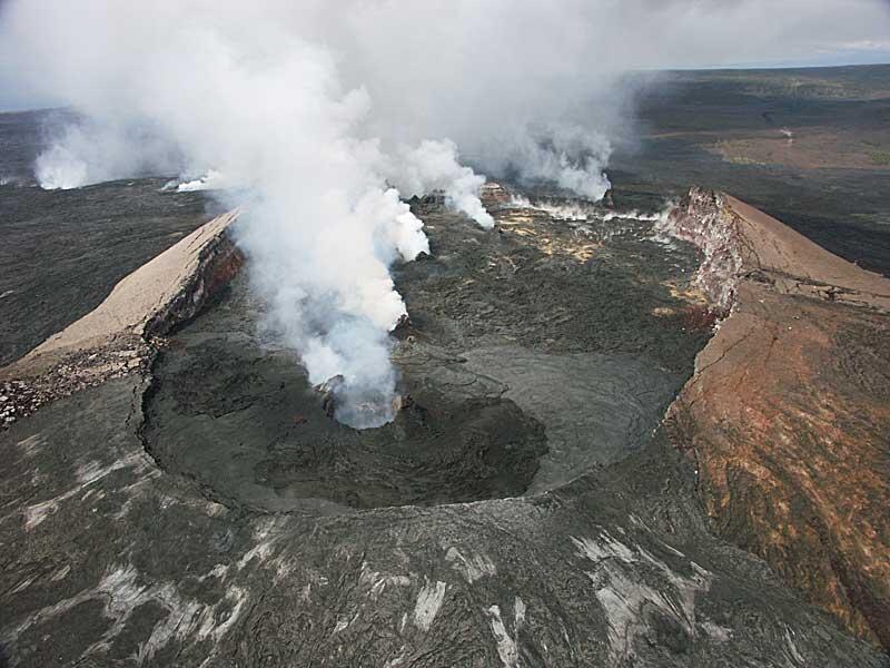 This is a photo of Pu`u `O`o crater, looking westward across the crater vents, most of which are incandescent at night.