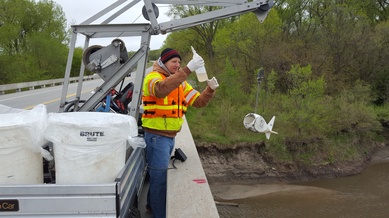 Collecting water-quality samples from the Elkhorn River near Waterloo, Nebr.