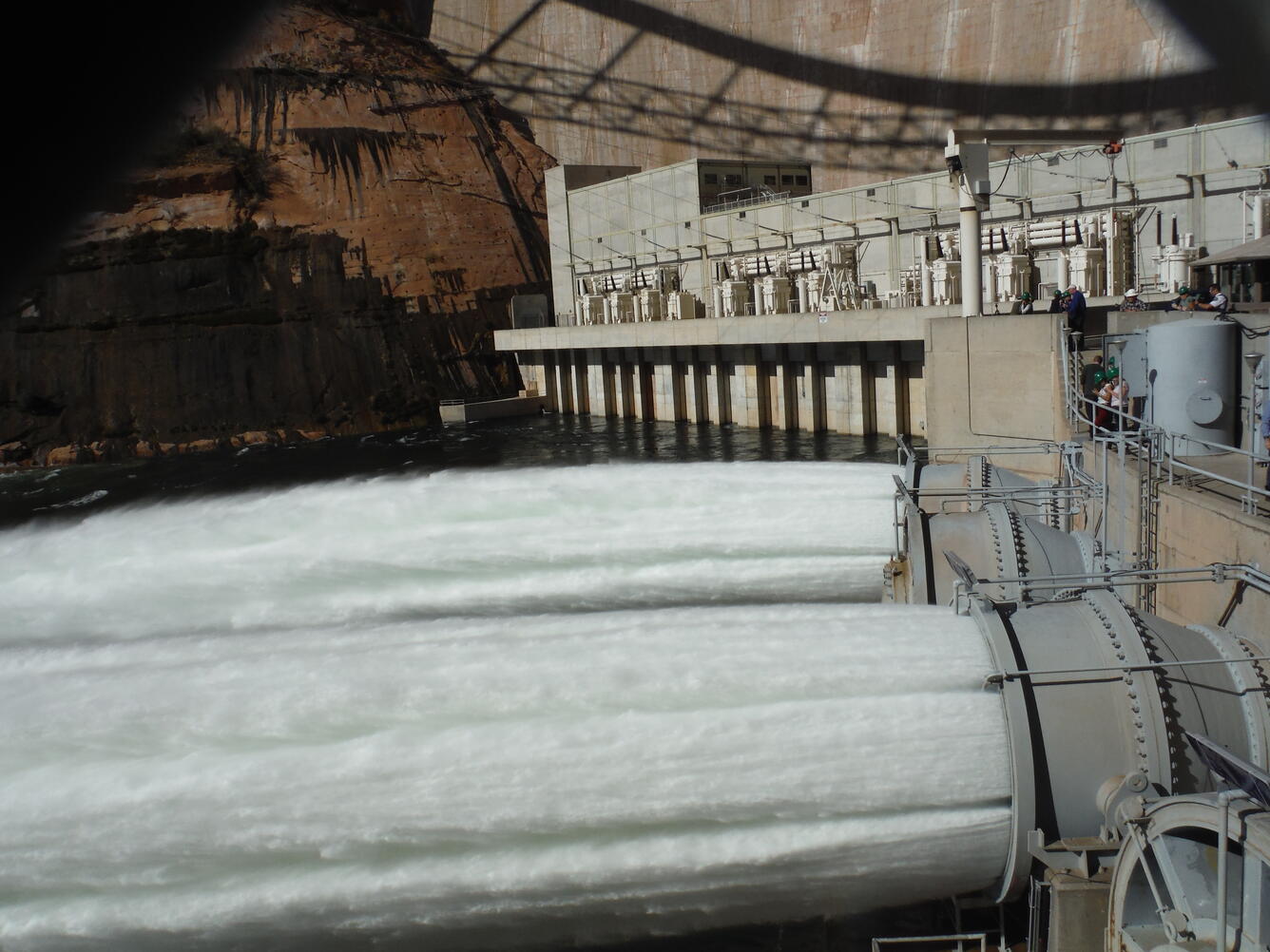 Glen Canyon Dam jet tubes releasing water into the Colorado River for a high flow experiment.