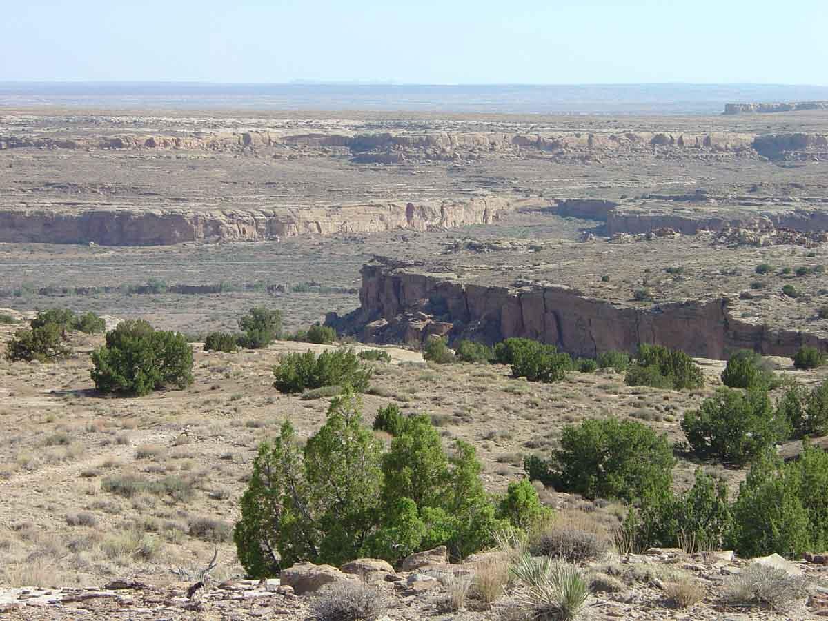 This is a photo of a view looking south toward the valley of Chaco Wash from the trail to Tsin Kletson on top of the north mesa.