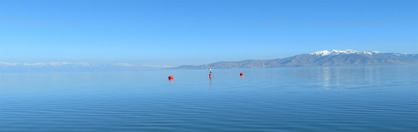 Great Salt Lake on a bluebird day; lake environmental sensing platform in center.
