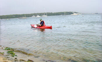 Fred Day-Lewis (USGS) deploys the cable off shore in a Kayak