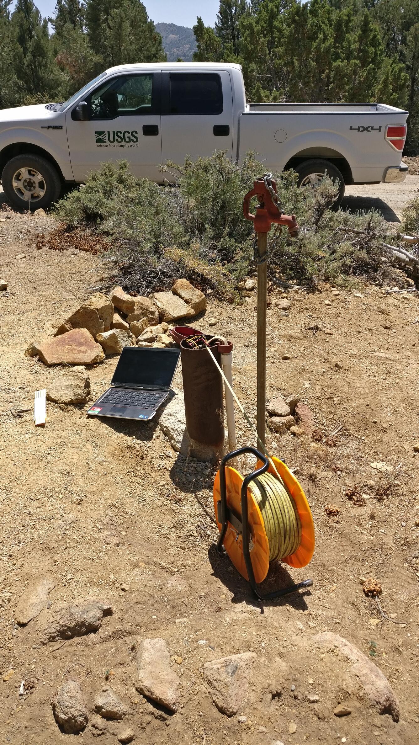 Measuring a well in the Virginia City Highlands, Nev.