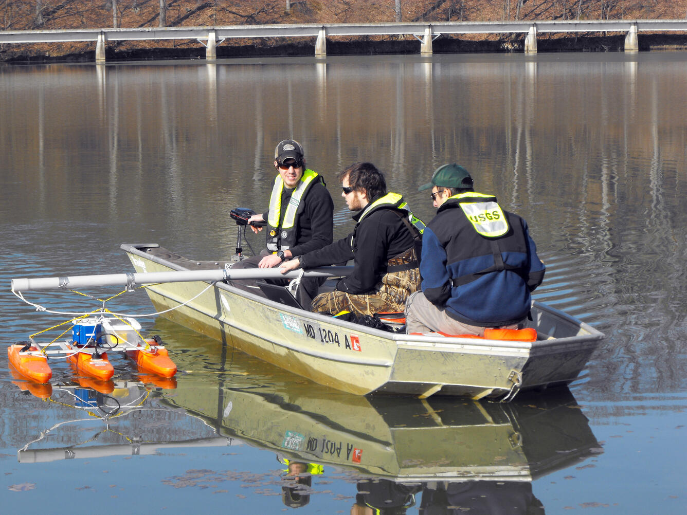 Hydrologic technicians in a boat