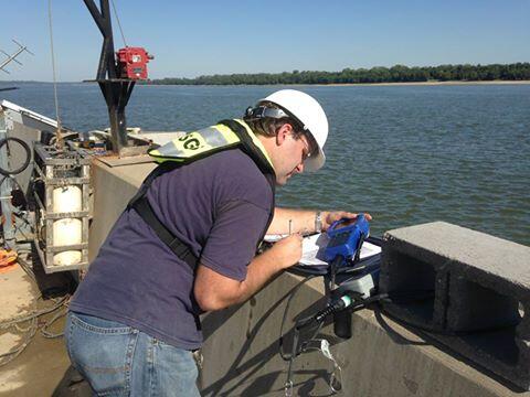Nathan Truax verifying and calibrating a water-quality sensor at the USGS Ohio River at Olmsted Lock and Dam super gage 