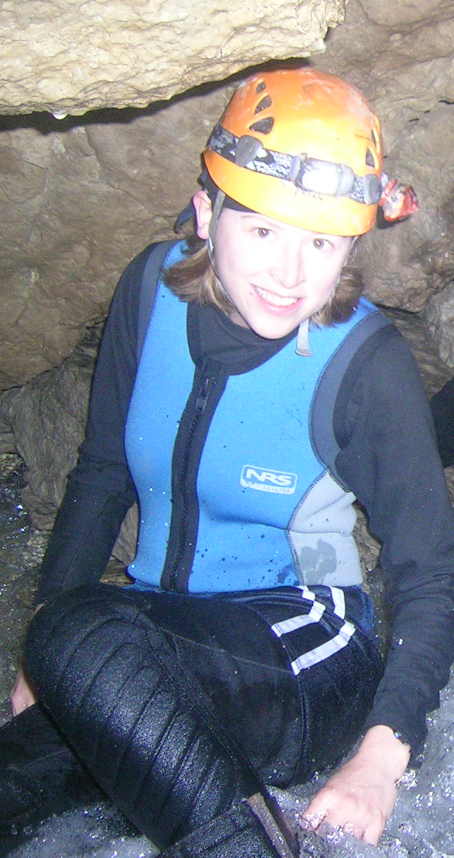 Photo of Kathy Knierim in a cave