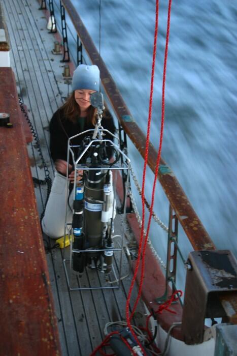 USGS scientist preparing a submersible instrument package that is used to collect water-quality data on the San Francisco Bay