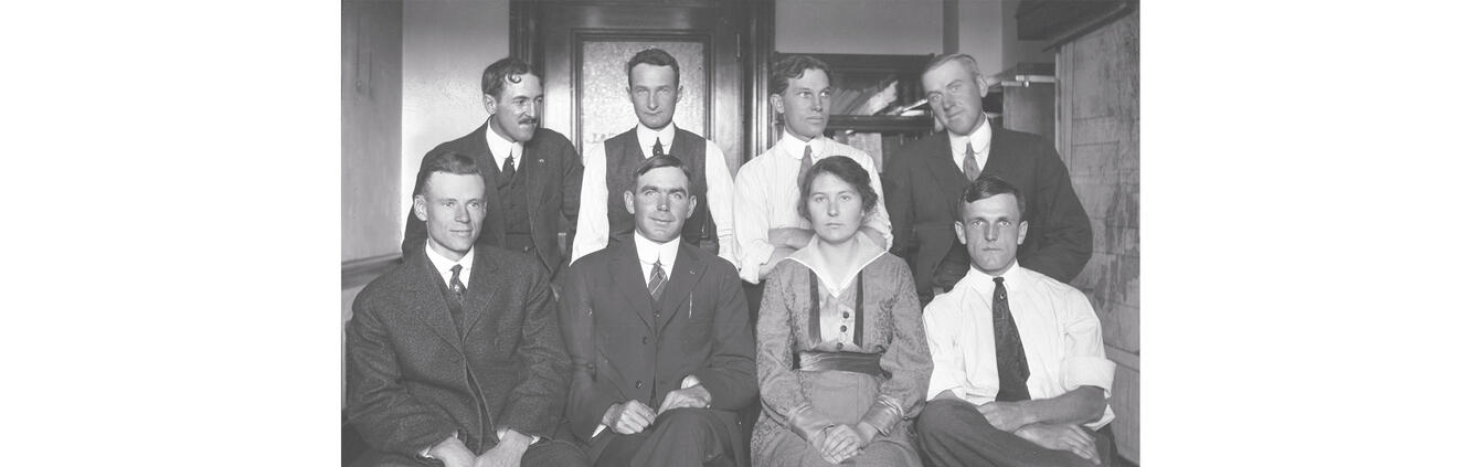 Eight USGS employees in Utah, known as the Salt Lake City Force, pose for photo in Federal Building Office in October 1914.
