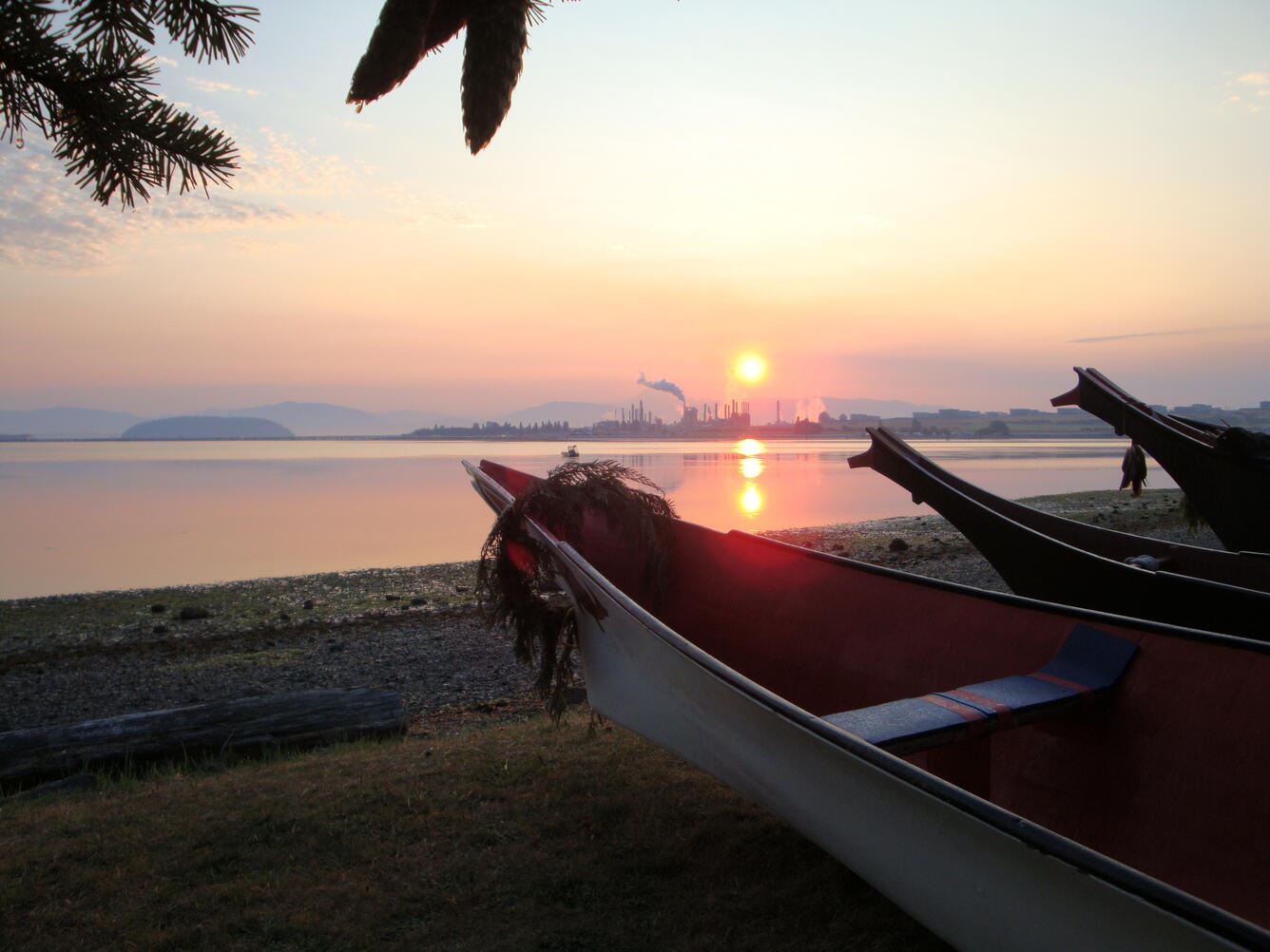 Sunrise over March’s Point from the Samish canoe landing near Anacortes, Washington.