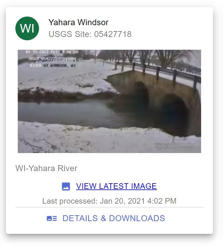 Screenshot of a SSTL webcam site, showing a stream flowing underneath a bridge during winter