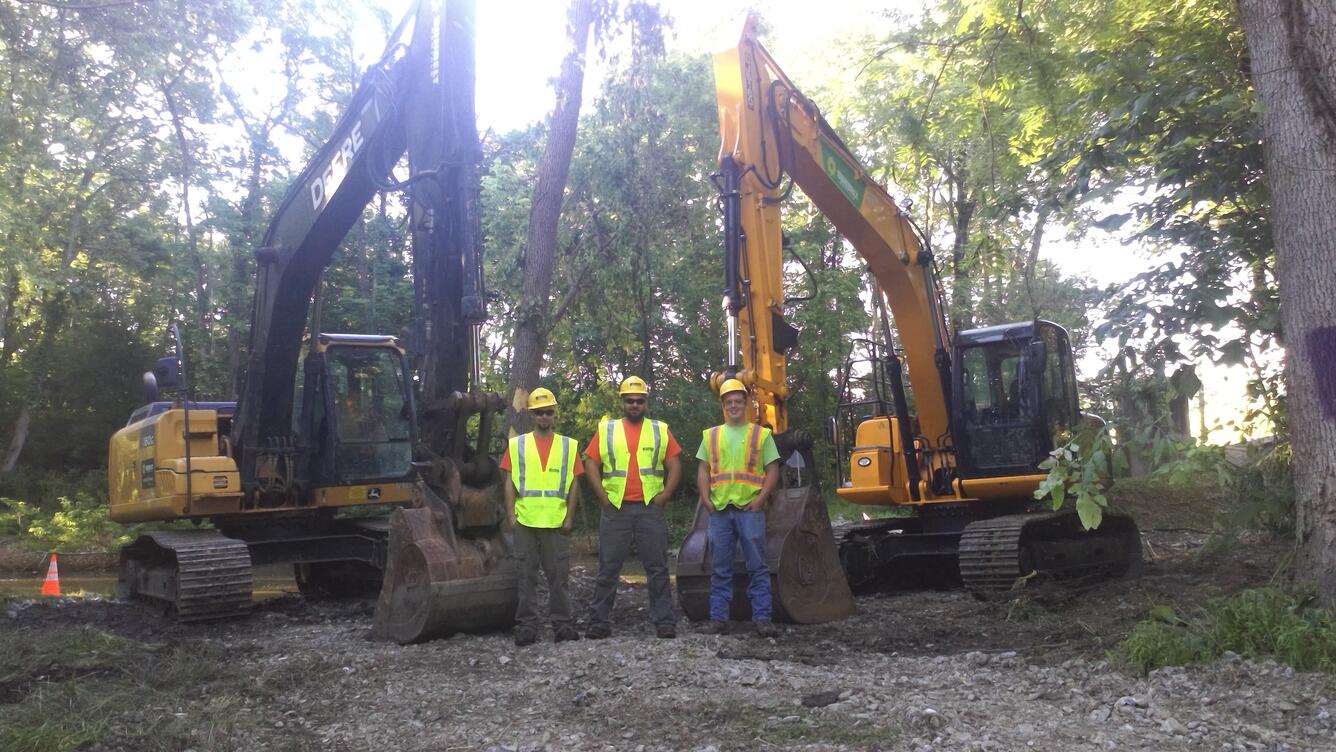 construction equipment, men, yellow, creek, trees, sunlight