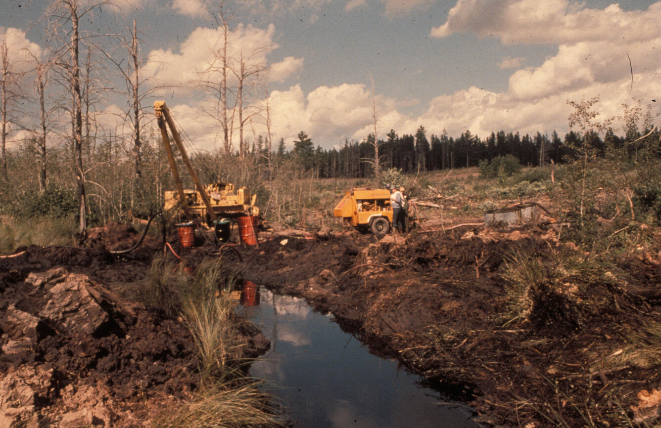 Excavating a trench in a wetland south of Bemidji pipeline break location. 