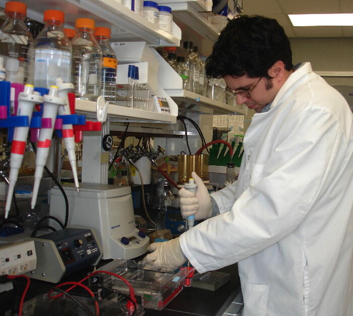 A USGS scientist prepares to analyze bacterial DNA extracted from water samples