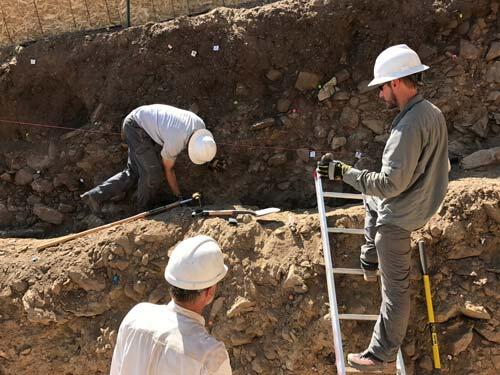 Scientists pin units in trench wall