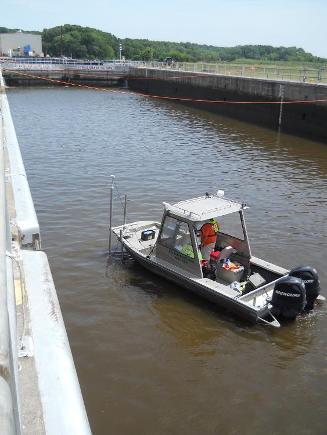 USGS survey boat in auxiliary lock during dye study 