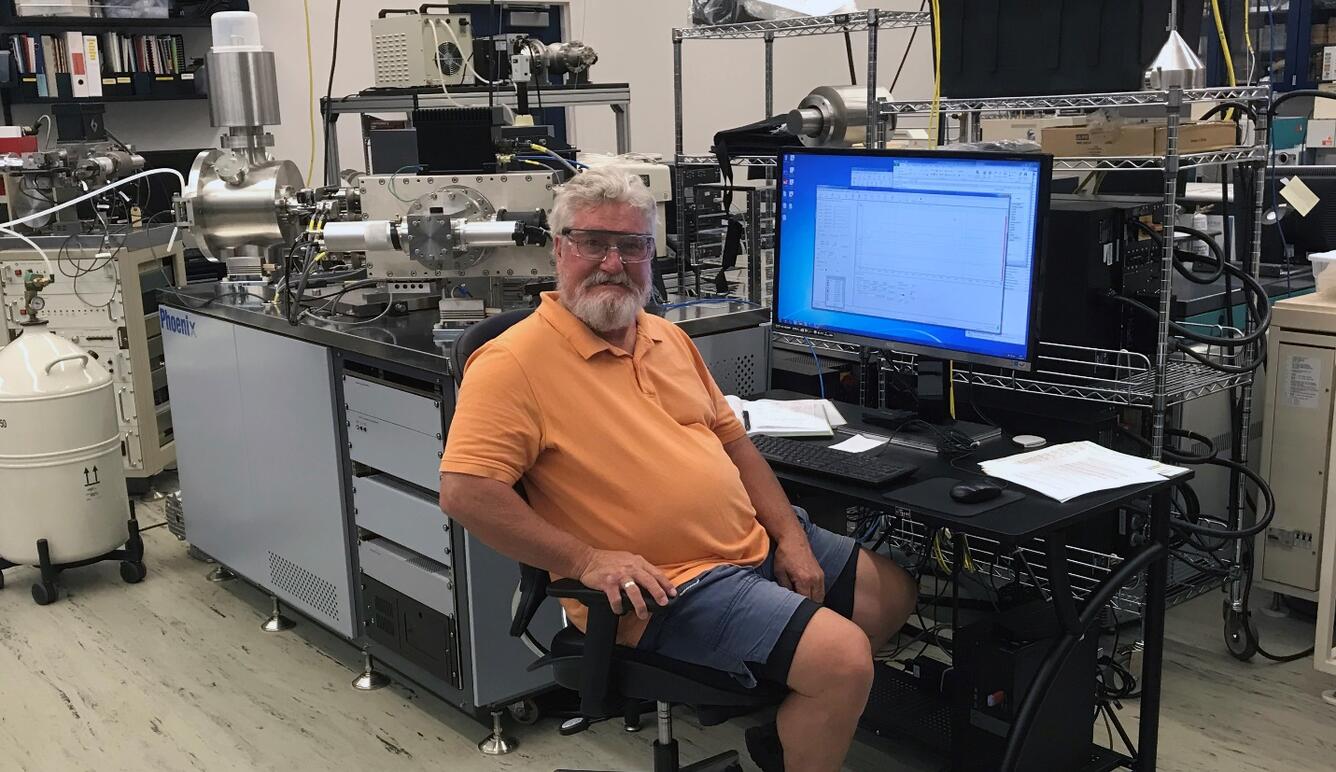 Scientist Wayne Premo working on a thermal-ionization mass spectrometer
