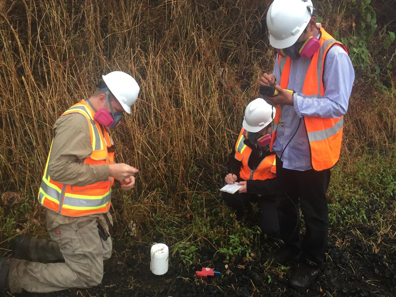 seismologists install a nodal geophone on Kīlauea's lower East Rift Zone