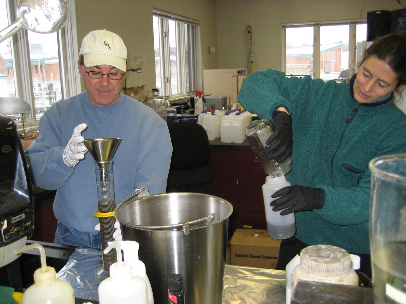 USGS scientists processing samples of combined sewer overflow water collected after a storm. 