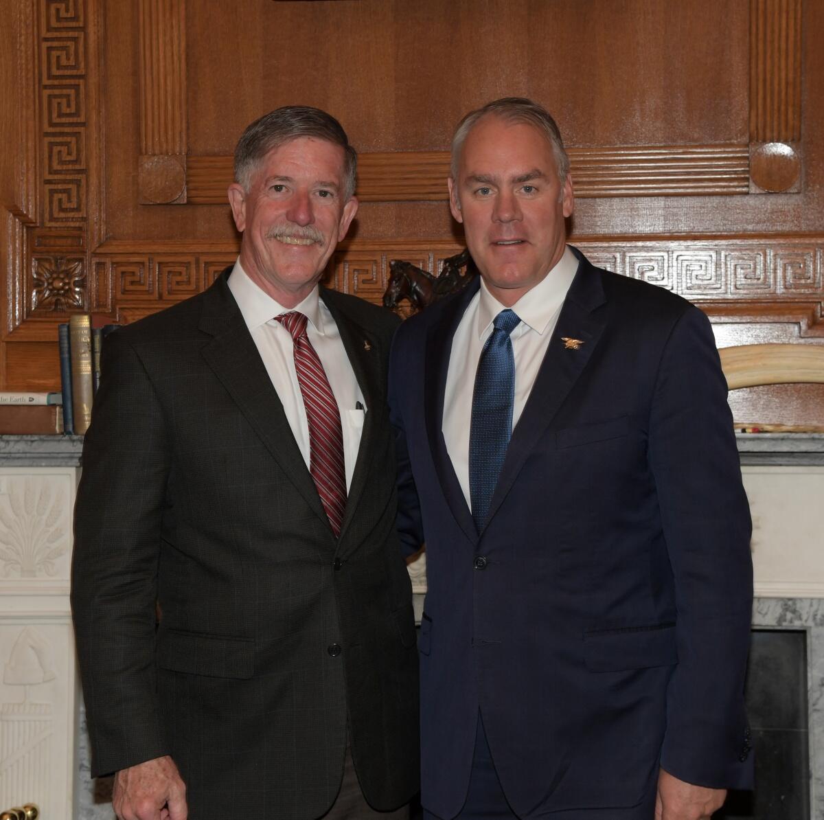 Secretary Zinke poses with Dr. Jim Reilly of the USGS.