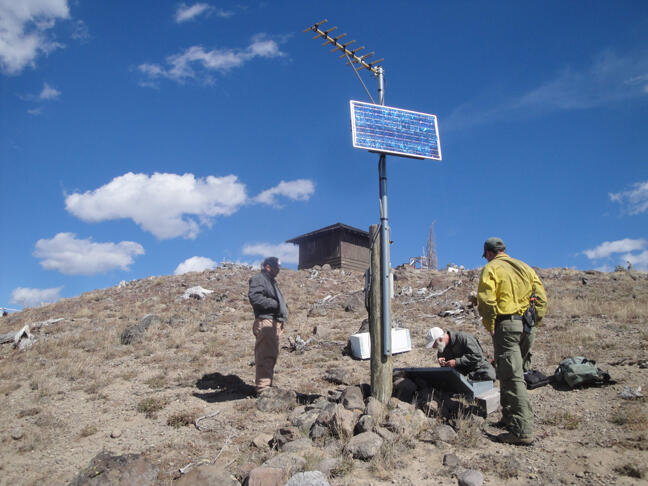 University of Utah engineer Dave Drobeck repairs a seismograph at P...