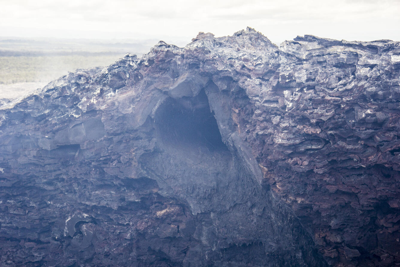A closer view of the entrance to the lava tube that had been supply...