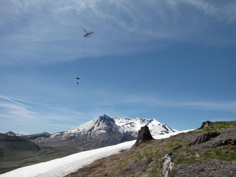 Helicopter lifts out winter-damaged and monitoring obsolete equipme...