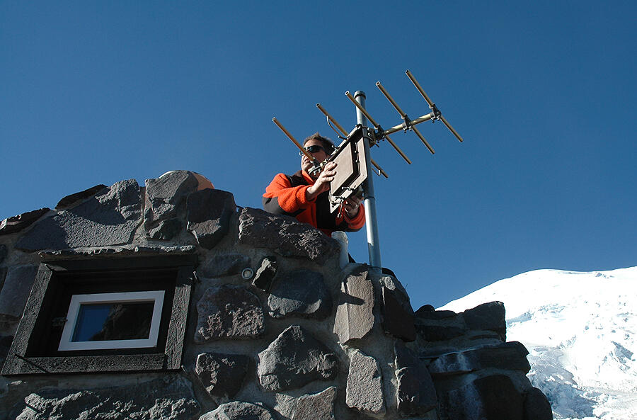 Antenna adjustment at Camp Schurman monitoring station ensures data...