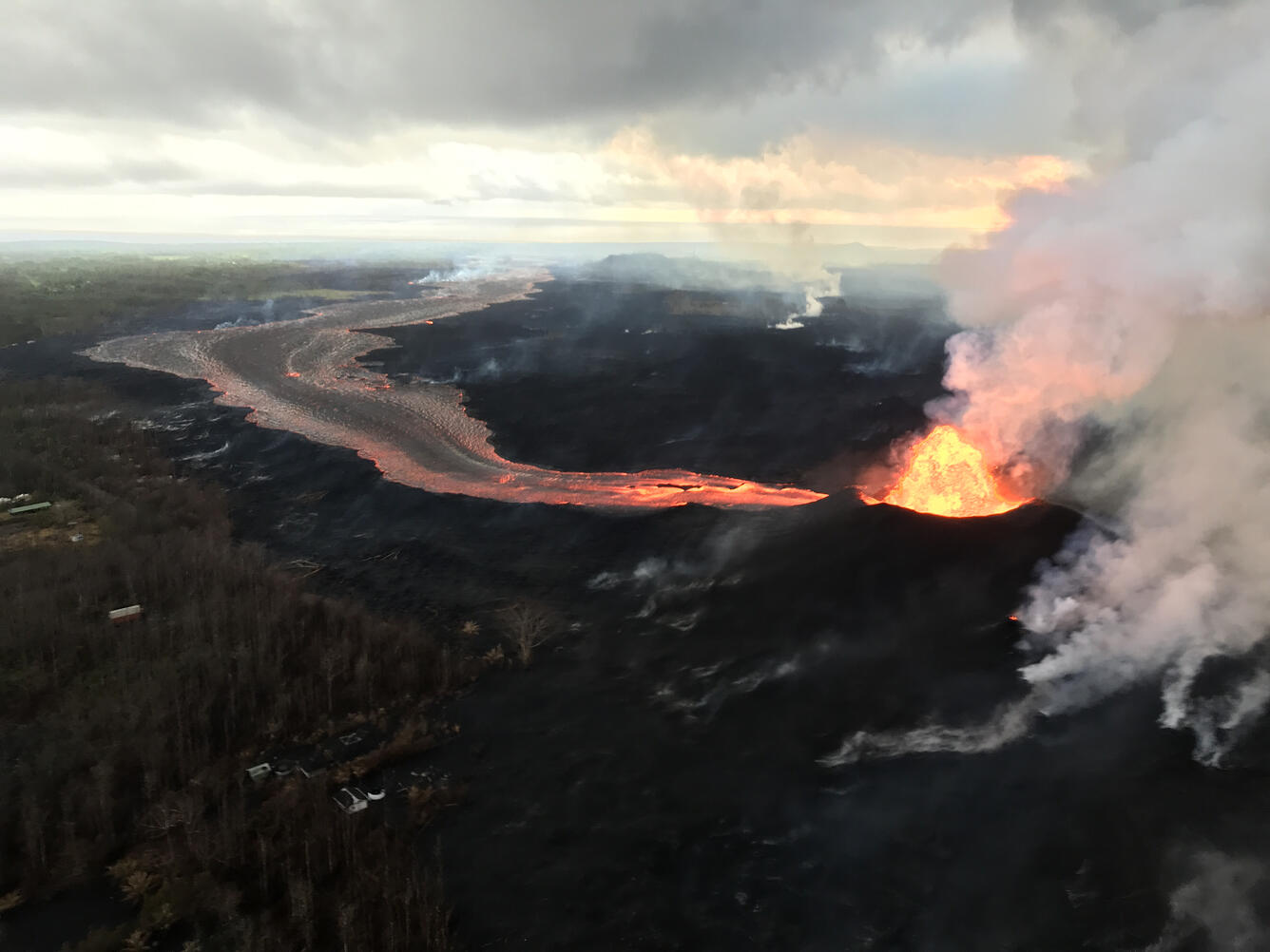 The fissure 8 fountain (shown at 6:30AM HST on June 7) feeds a lava...