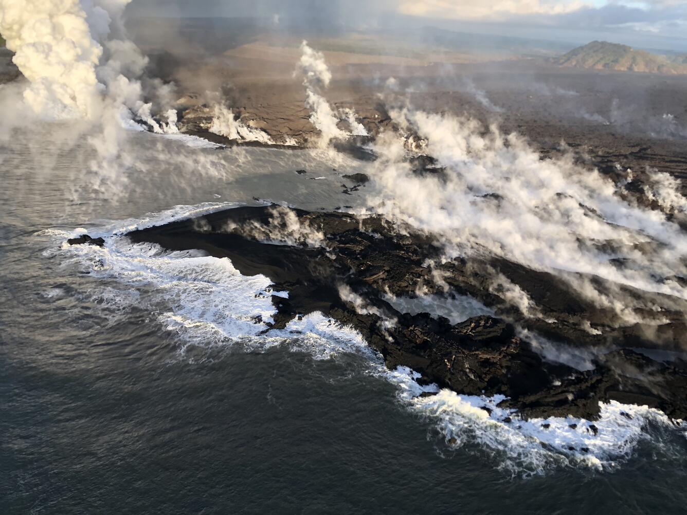 View of the lava delta at Kapoho. The new coastline, following the ...