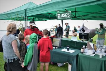Image of USGS scientist, Neil Ganju, at the Woods Hole Science Stroll outreach event