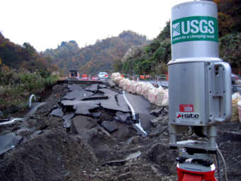 Lidar equipment is in foreground, near a road failure caused by an earthquake in Japan in 2004.
